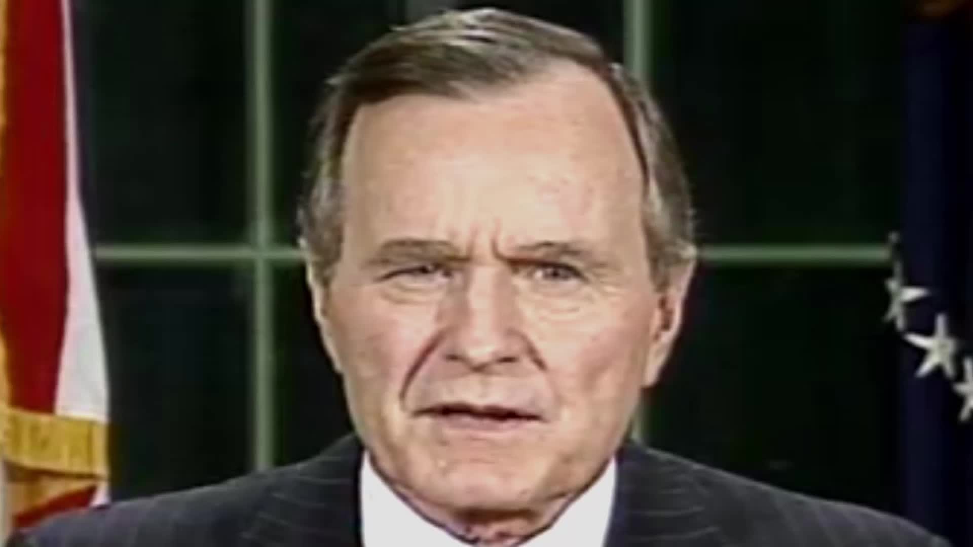 The former President of the United States is speaking directly to the camera, his brow furrowed. Behind him, the American flag and a dark blue curtain are visible on what appears to be a VICE TV broadcast.
