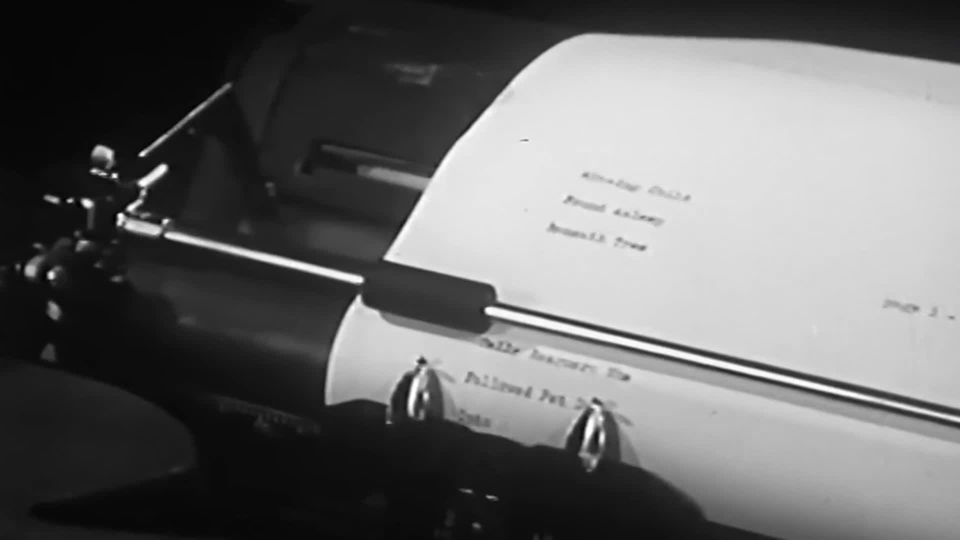 The typewriter's carriage is moving, and the paper is slowly filling with typed words. The scene feels old, like something from a United States VICE TV documentary.
The typewriter's carriage is moving, and the paper is slowly filling with typed words. The scene feels old, like something from a United States VICE TV documentary.