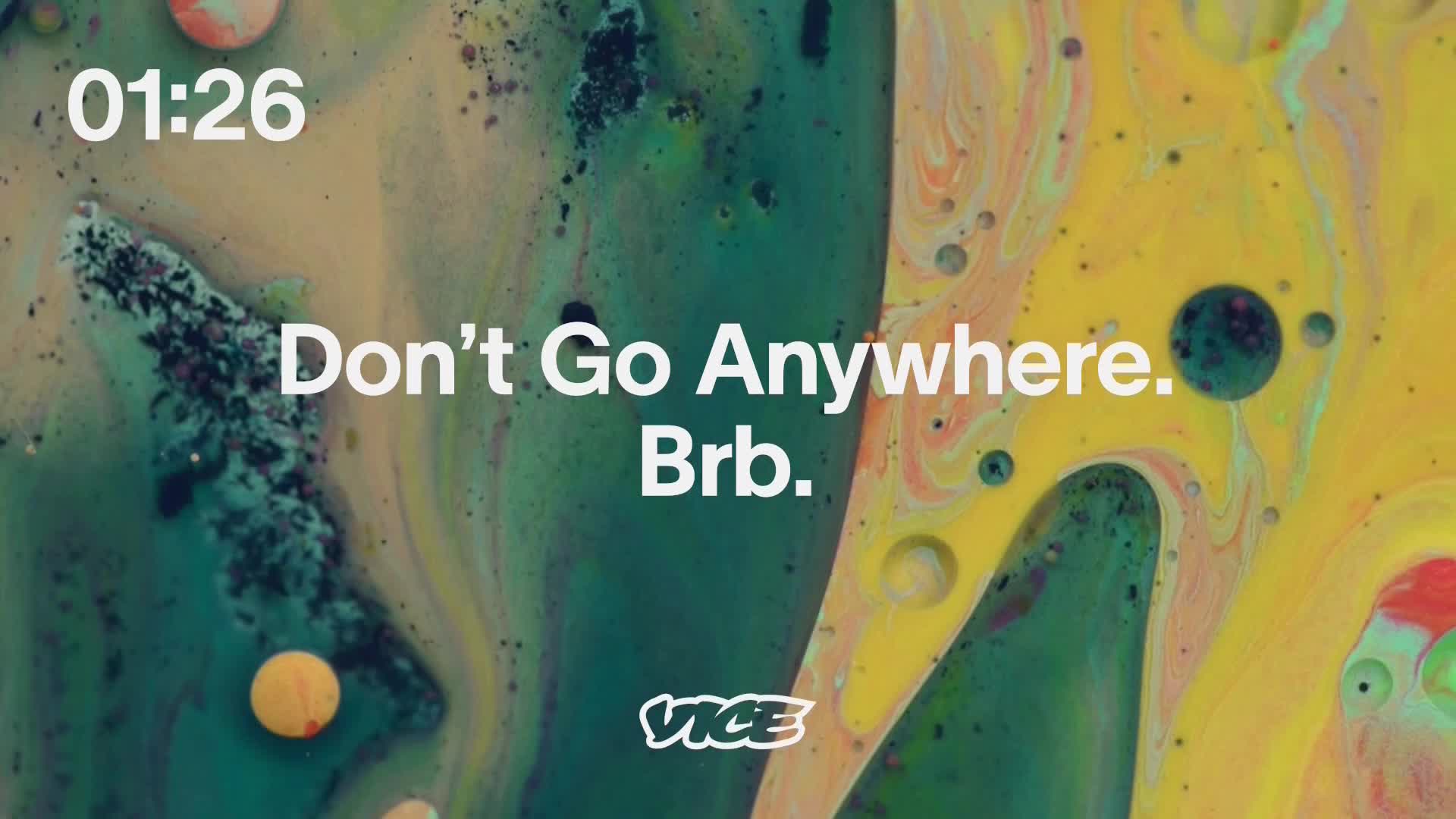 The VICE logo sits at the bottom, and the screen tells me not to go anywhere. A swirling mix of colors, like oil and water, fills the background.
