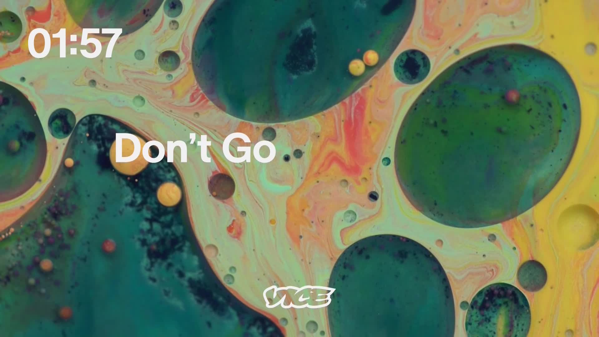 The screen displays a timer at 01:57, overlaid on a swirling, abstract pattern of greens, yellows, and reds. The words "Don't Go.." are prominent in white text, and the VICE logo appears in the lower right corner.
