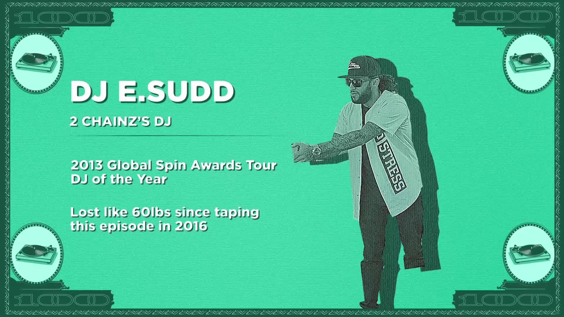 DJ E.Sudd, 2 Chainz's DJ, stands with his arms outstretched. He's wearing a baseball jersey that reads "NO STRESS" down the side.