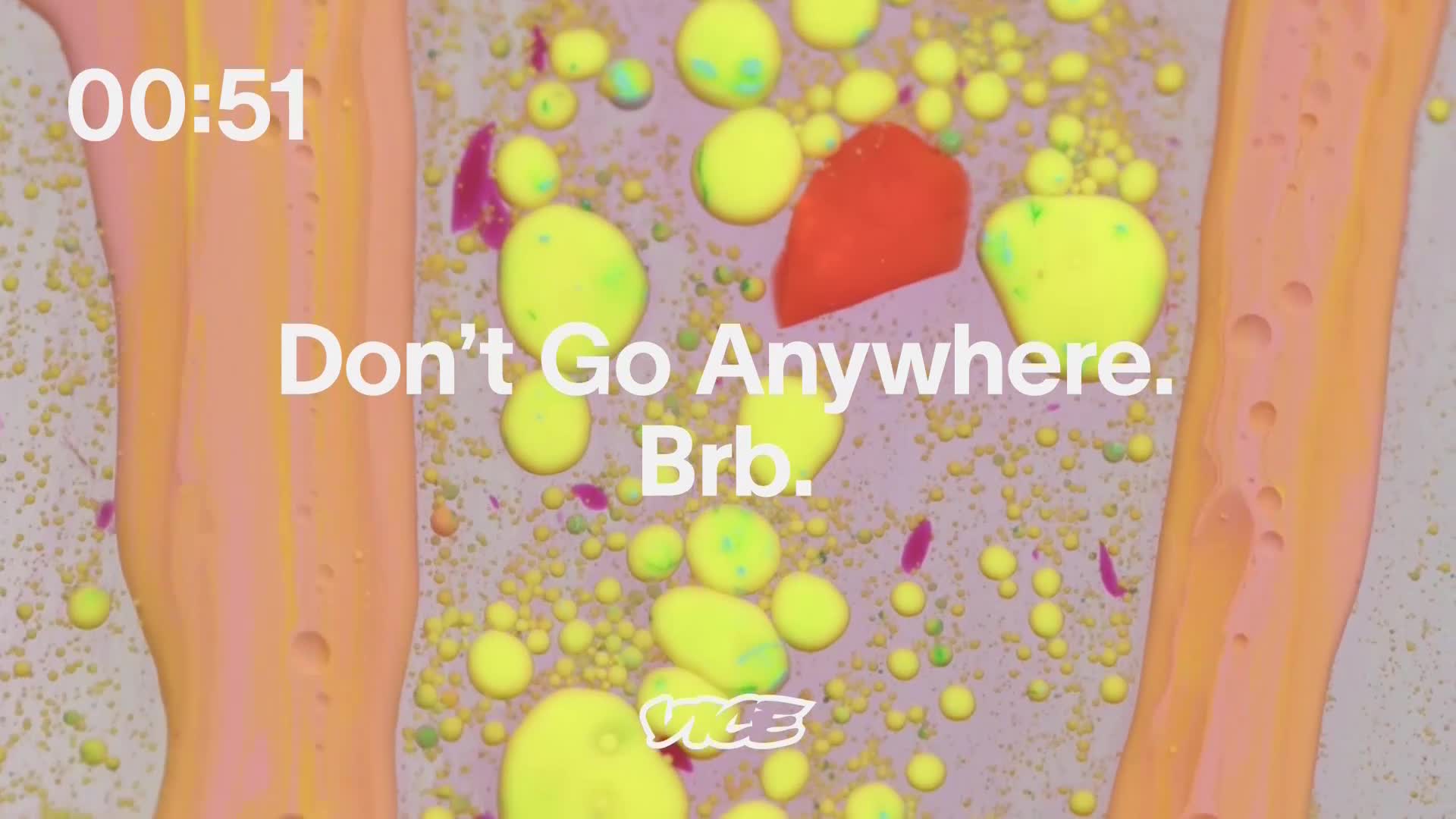 A timer counts down from 00:51 as bright yellow and orange liquids swirl and form small bubbles. The VICE logo appears near the bottom of the screen.