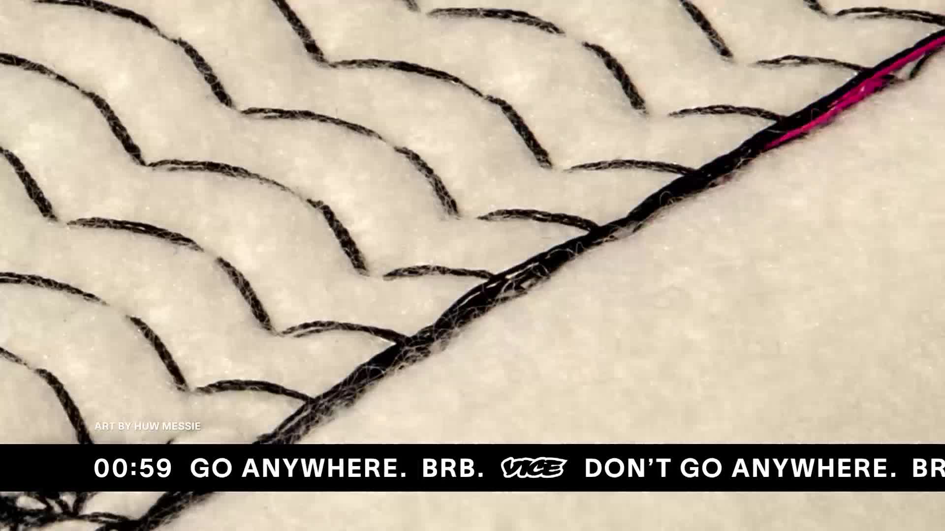 Thick black stitching snakes across a pale fabric, a thin line of magenta peeking through on the right. A timer counts down to 00:59, with the words "GO ANYWHERE. BRB. VICE DON'T GO ANYWHERE." displayed below.