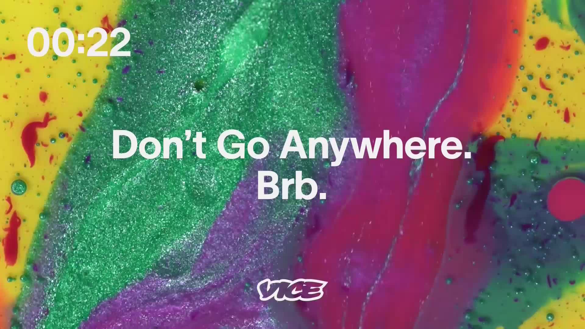 The timer counts down from 00:22 as vibrant, swirling colors of yellow, green, and purple bleed into each other. A bold message, "Don't Go Anywhere. Brb.", appears over the psychedelic mix, with the VICE logo at the bottom.