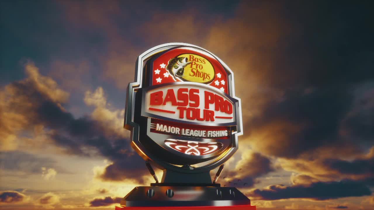 The Bass Pro Tour logo, set against a dramatic sky, glows with a metallic sheen. The Major League Fishing emblem sits proudly, ready for the next competition.
