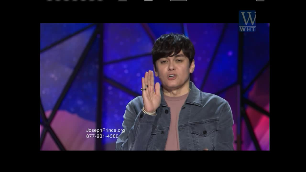 A man in a denim jacket speaks, holding his hand up. The World Harvest Television logo appears in the upper right corner.