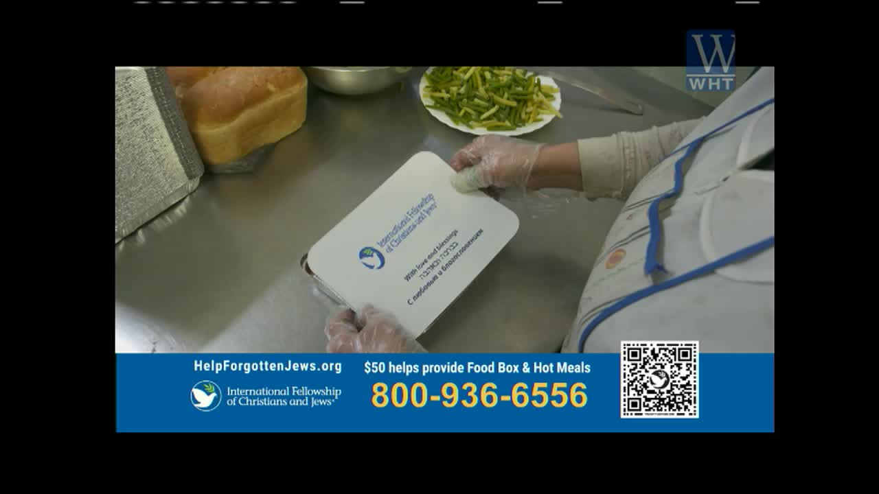 Gloves on, someone is closing a white food container. A loaf of bread sits nearby, ready for distribution.