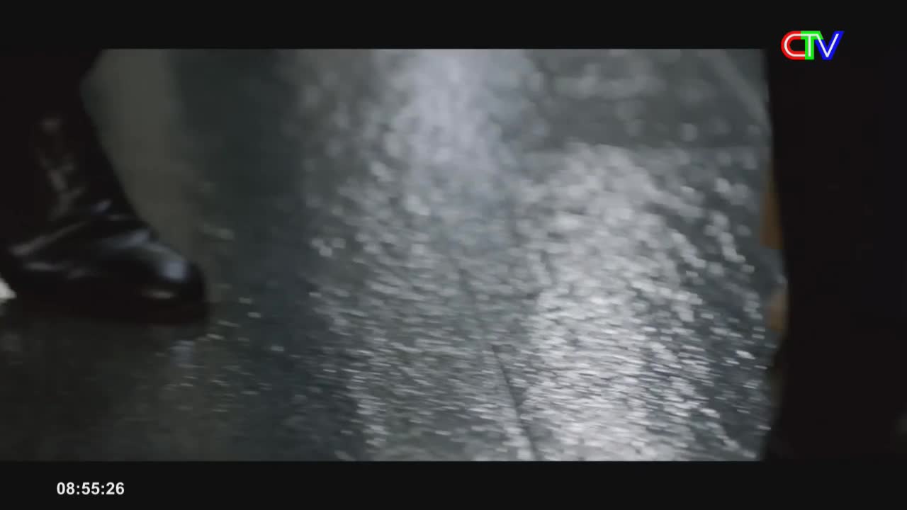 A black boot steps onto a wet, reflective surface, sending ripples across it. The CTV logo flashes in the corner, a familiar sight from Ca Mau.