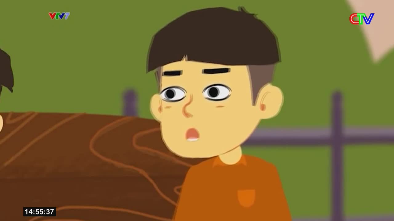A young boy with wide, startled eyes looks off-screen, his mouth slightly agape. The Ca Mau TV logo appears in the corner, indicating this scene is from Vietnam.