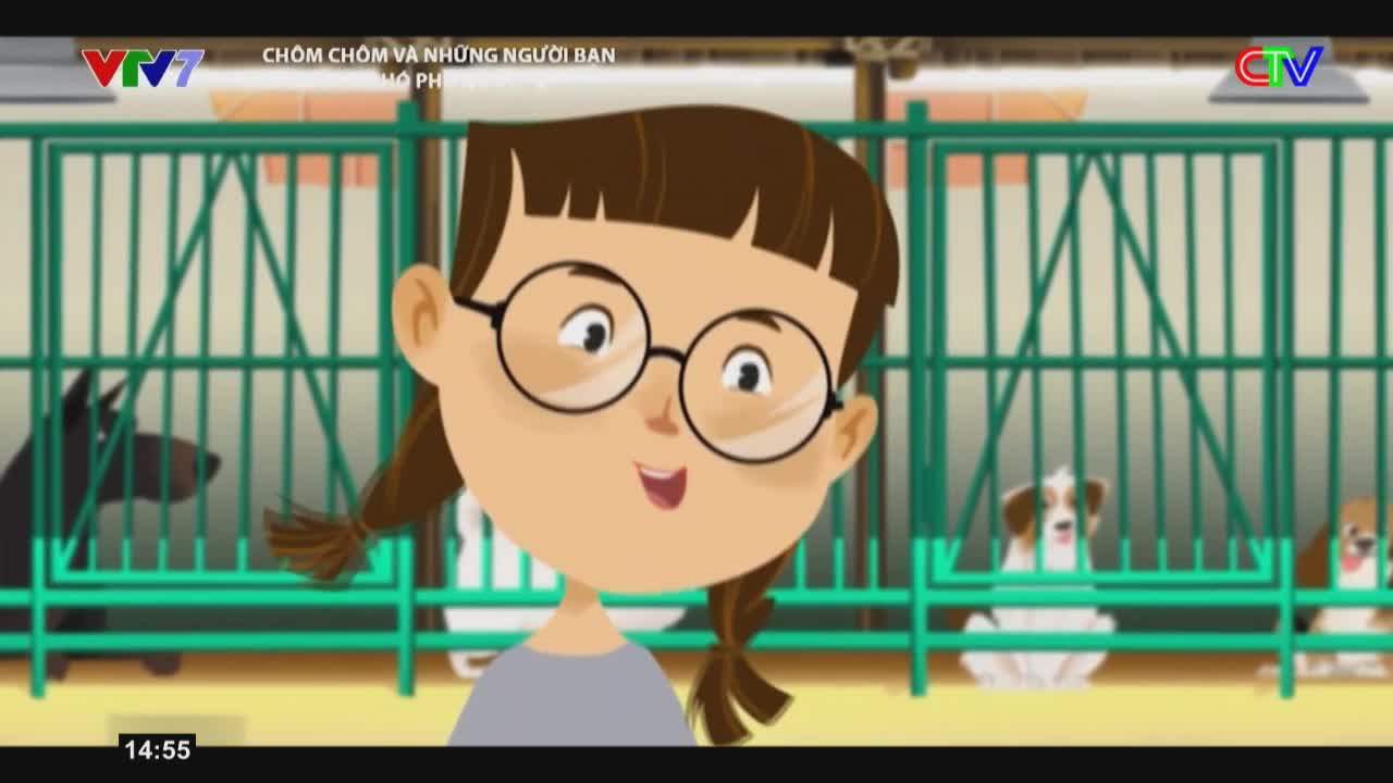 A young girl with glasses and pigtails smiles, looking towards the camera. Behind her, dogs are visible in kennels, some peeking through the bars.