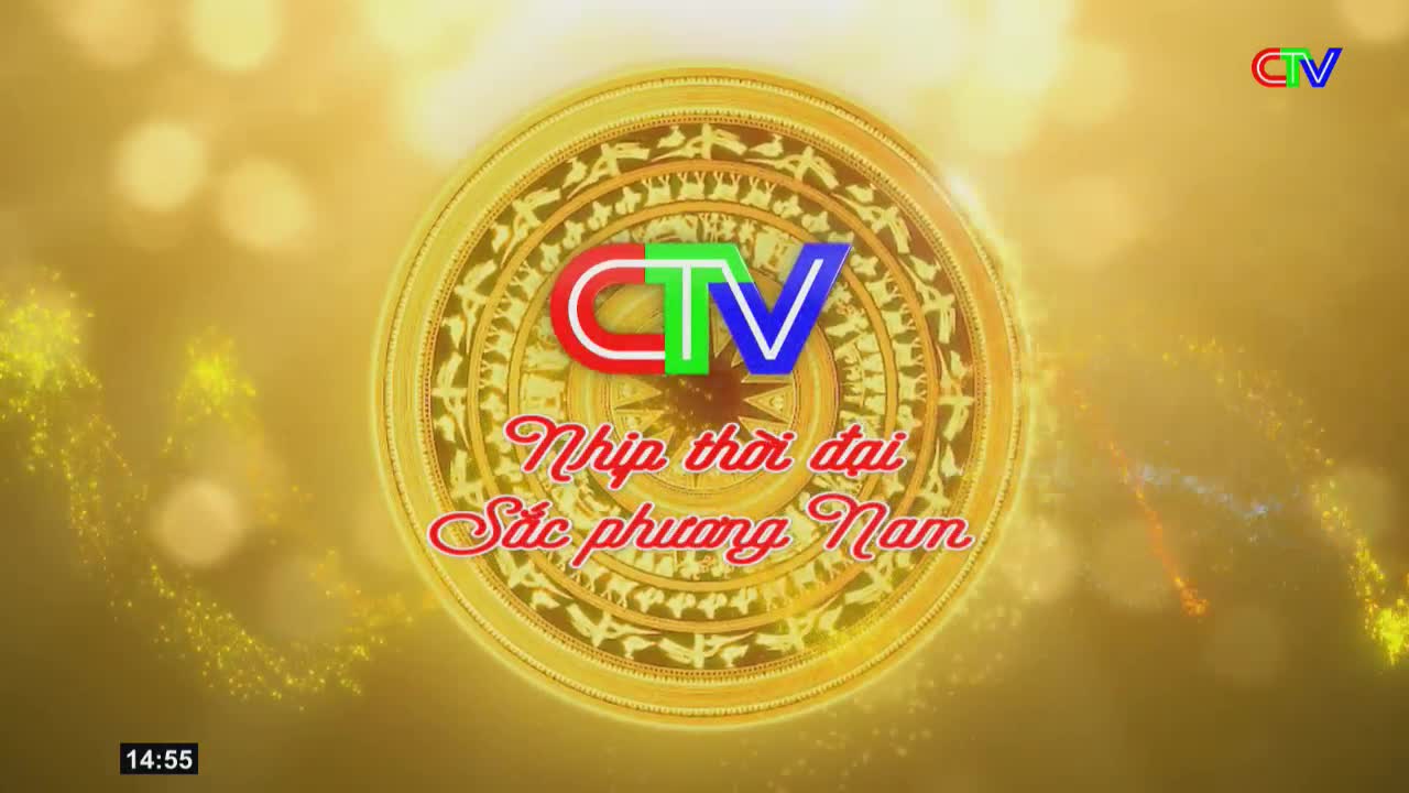 The Ca Mau TV logo, a vibrant CTV, spins at the center of a golden, ancient drum.  Golden sparks drift across the screen, catching the light.