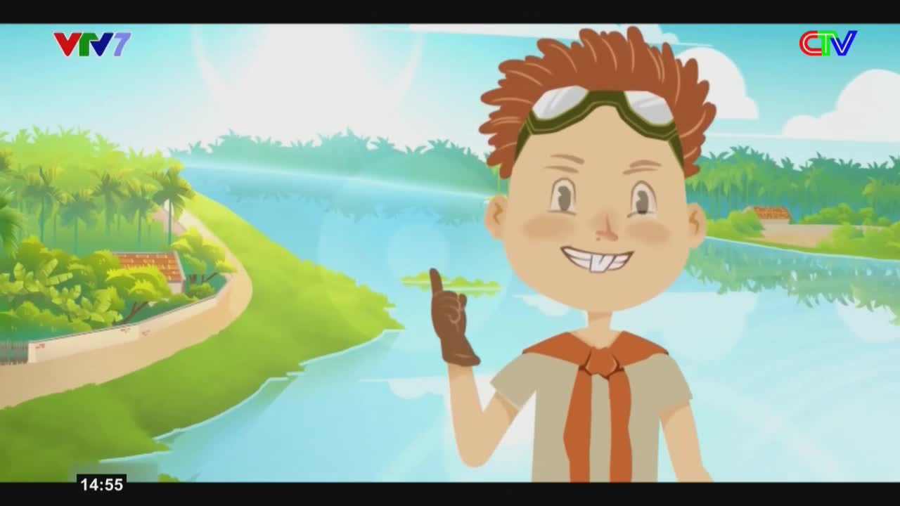 A boy in goggles and a brown glove points his finger forward, a wide smile on his face. He stands against a backdrop of lush green trees and a calm blue river, the kind you'd find in Ca Mau.