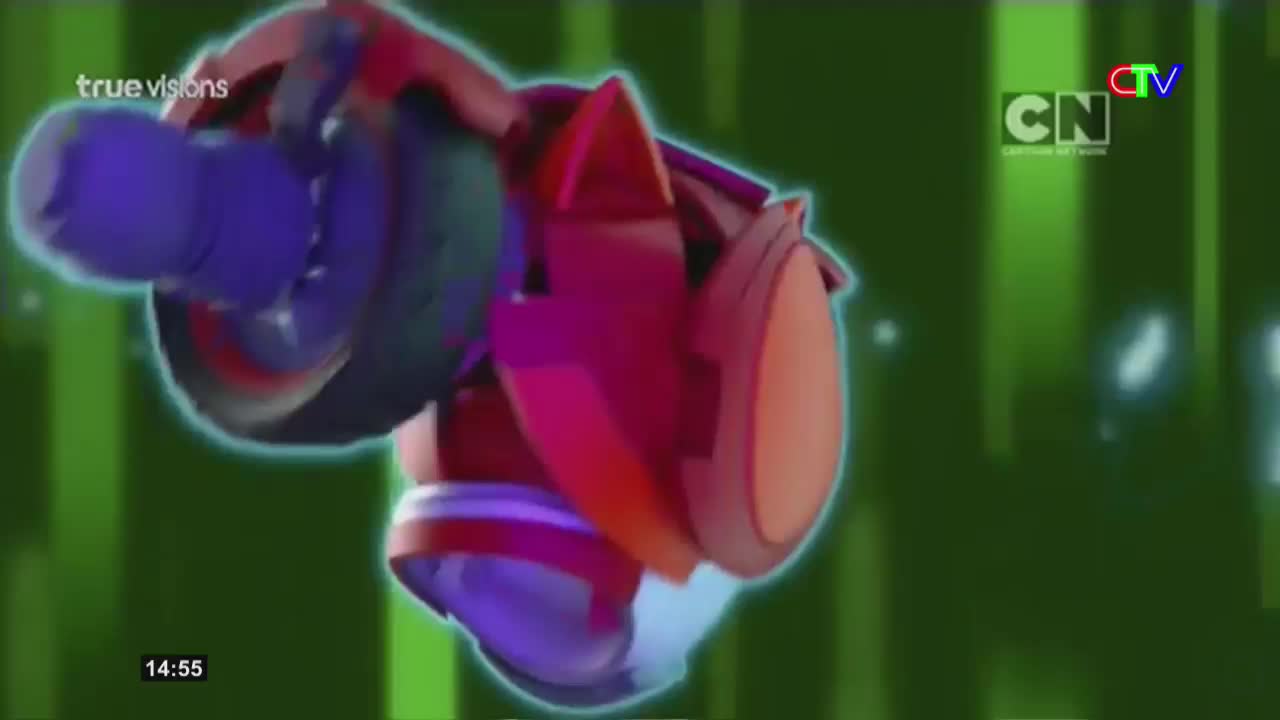 A large, red mechanical arm with a blue barrel is spinning rapidly. The background is a vibrant green with glowing lines, reminiscent of a digital display from Ca Mau TV.