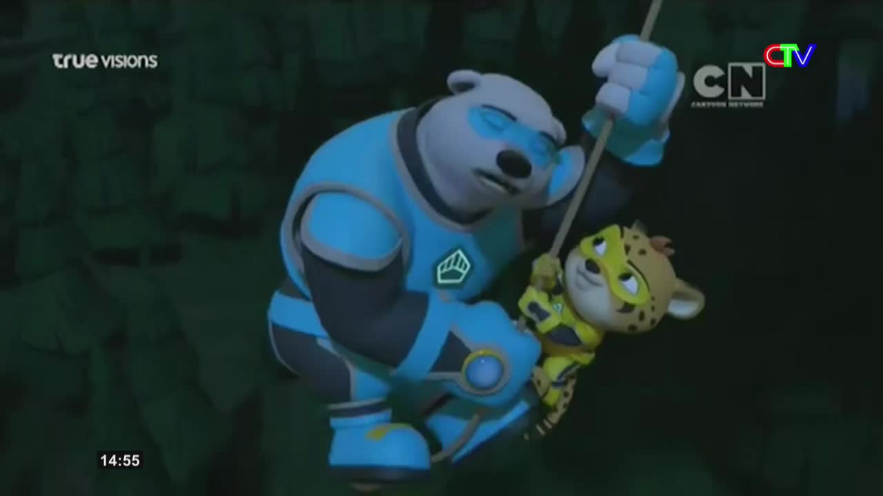 A large polar bear in a blue suit is swinging a small leopard on a rope. The leopard, wearing a yellow costume, clings tightly to the rope.