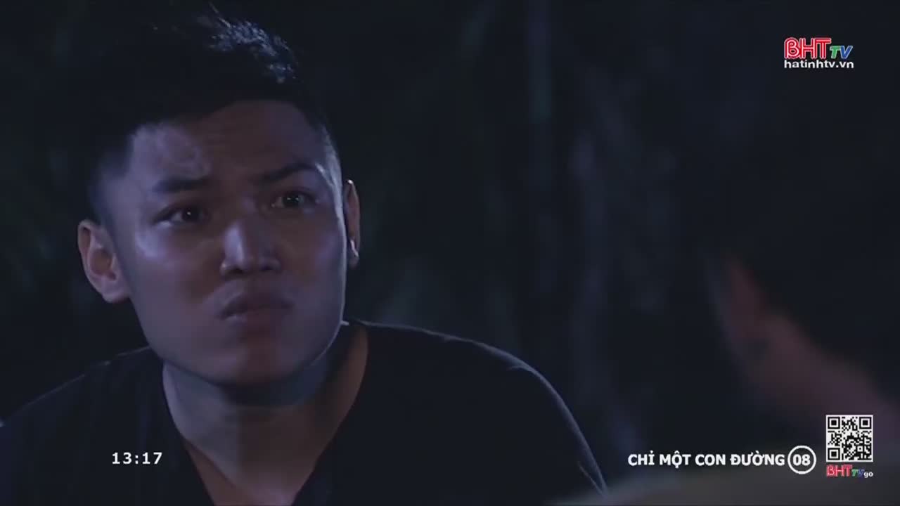 A young man stares intently, his brow furrowed, as he listens to someone off-screen. The scene, from Ha Tinh TV in Vietnam, is dark, and the time on the screen reads 13:17.
