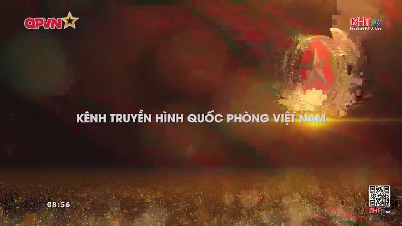 A stylized red star emblem rotates against a dark, fiery background. White text, "KÊNH TRUYỀN HÌNH QUỐC PHÒNG VIỆT NAM," appears across the middle.