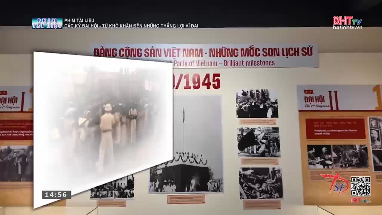 A grainy video clip plays on a screen, showing a group of people in light-colored uniforms. Behind it, a large banner proclaims "ĐẢNG CỘNG SẢN VIỆT NAM - NHỮNG MỐC SON LỊCH SỬ" in red letters, with "Party of Vietnam - Brilliant milestones" below.