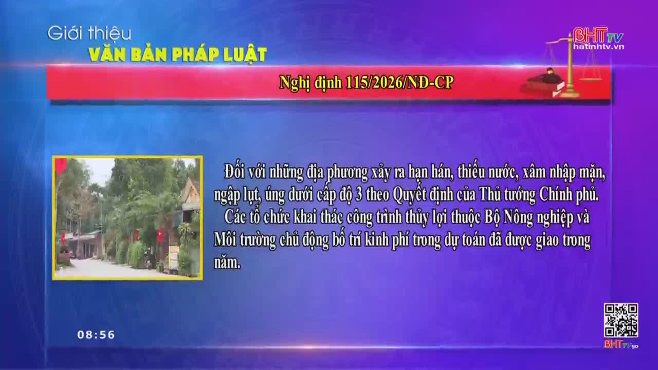 A rural road winds past houses and lush trees. On the screen, text discusses legal documents from Vietnam.