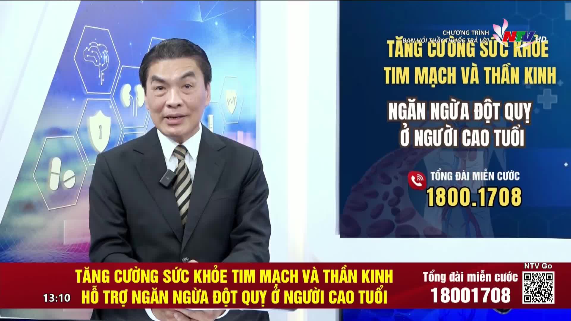 A man in a suit, speaking directly to the camera, is the focus of this Nghe An TV broadcast. The screen beside him displays information about health and preventing strokes in the elderly, with a phone number for viewers to call.
