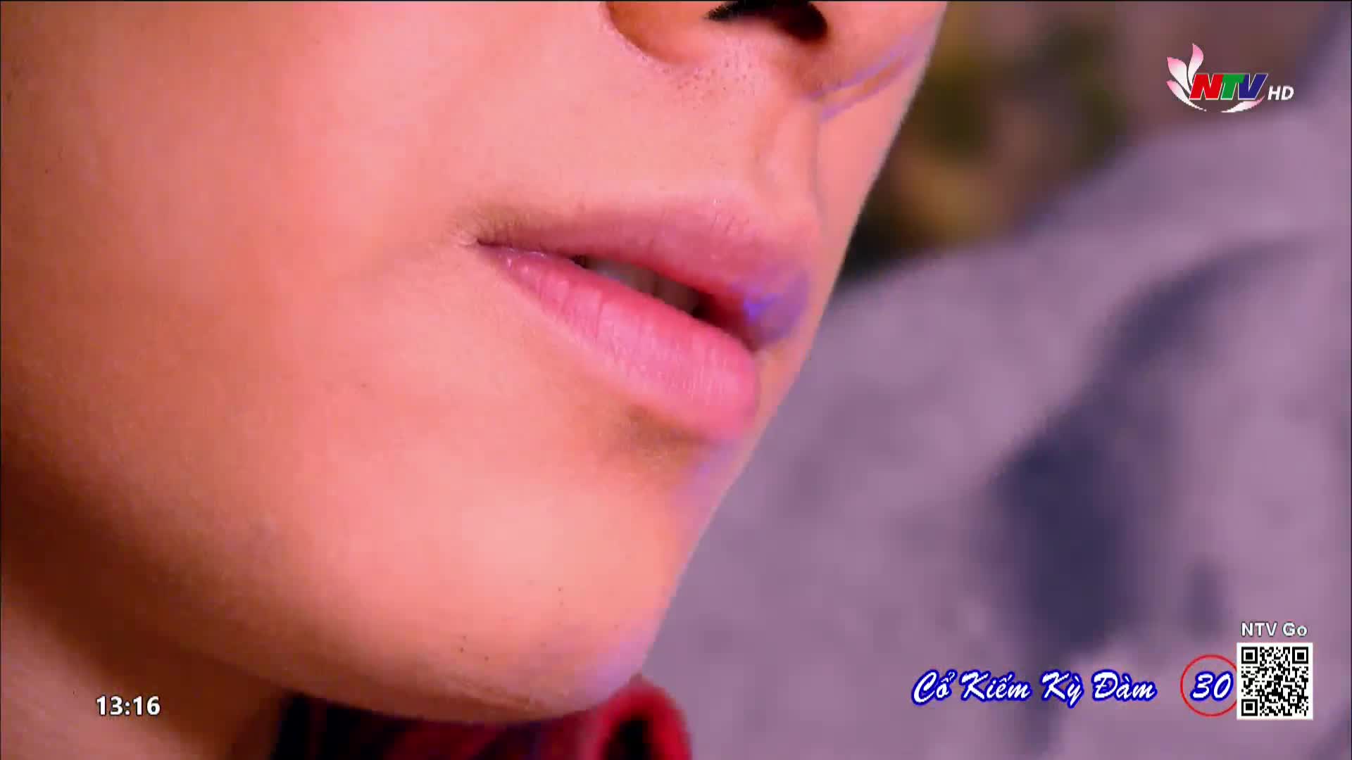 The person's lips are slightly parted, and the skin around them is in soft focus. The Nghe An TV logo is visible in the corner, and the episode number is displayed below.

