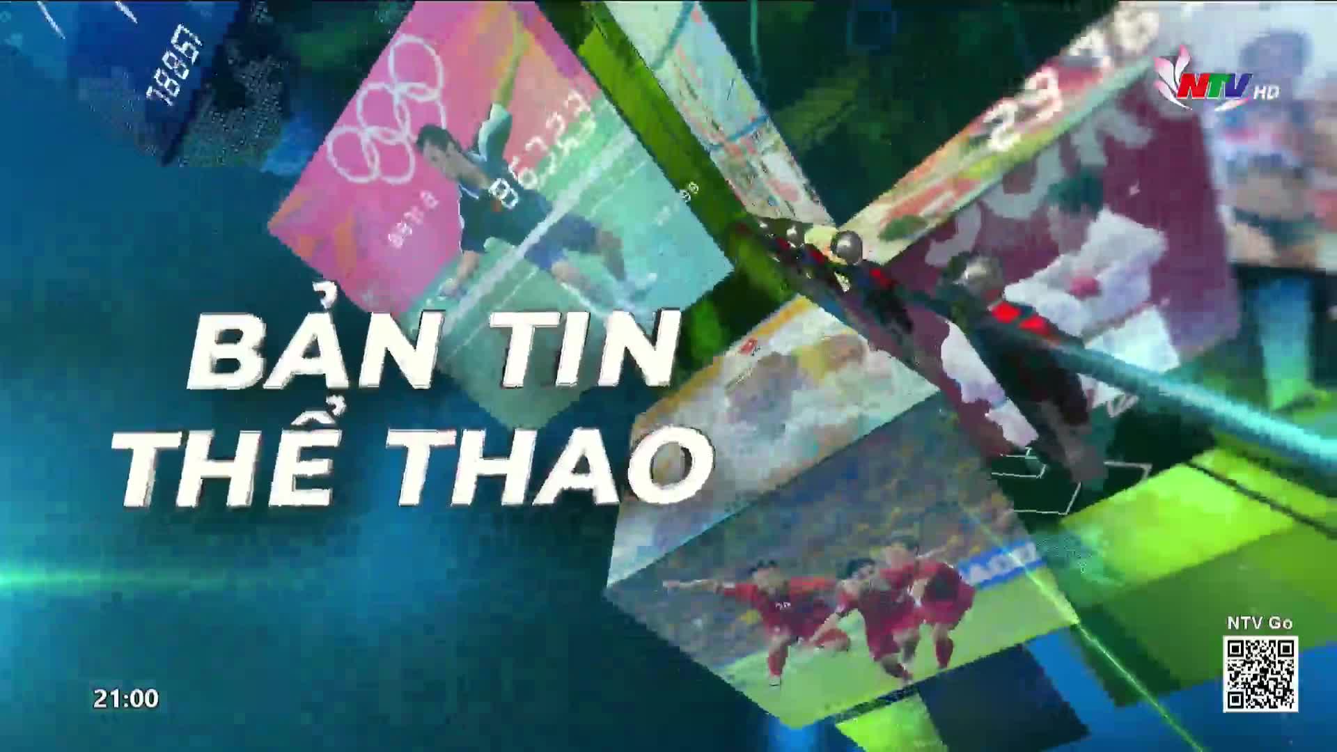 The Nghe An TV logo appears on screen next to a QR code. Large white text reads "BẢN TIN THỂ THAO" as a montage of sports images rotates behind it.