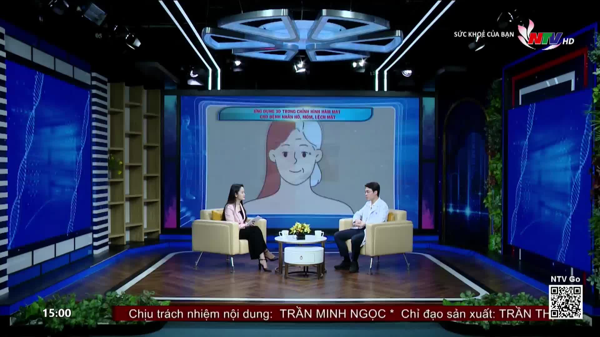 A woman in a pink jacket and a man in a white coat sit opposite each other on yellow chairs in a studio. A graphic of a woman's face, half colored red and half white with wrinkles, is displayed behind them on a large screen. The NTV HD logo is visible in the upper right corner.