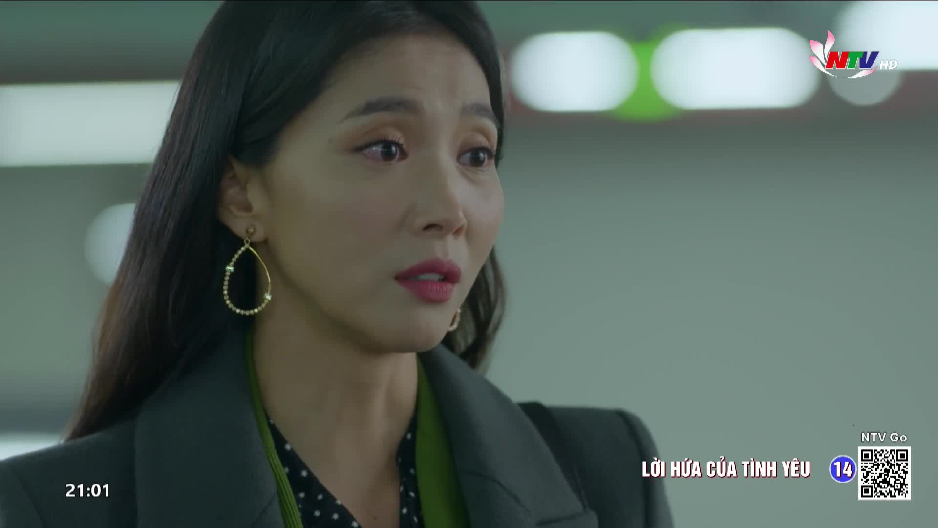 A woman with dark hair and a surprised expression looks off-camera. The NTV logo appears in the upper right corner, indicating this is from Nghe An TV in Vietnam.