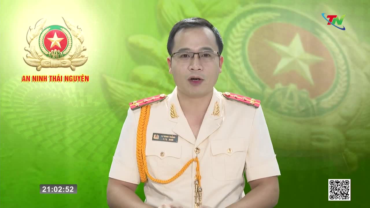 A man in a light-colored uniform with red and gold epaulets speaks directly to the camera. The Thai Nguyen TV logo is visible in the upper right corner.