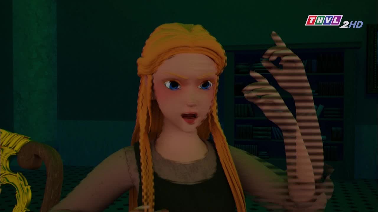 A woman with long blonde hair gestures with both hands, her expression one of surprise.  The animated scene, broadcast on Tra Vinh TV, shows her in a dark room, presumably mid-conversation.

