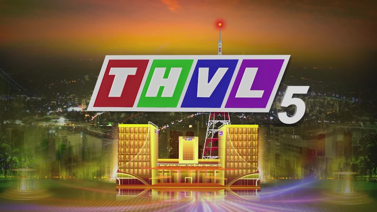 The THVL 5 logo, in bright colors, floats above a stylized building. A cityscape glows in the background, with the words "Báo VÀ PHÁT THANH TRUYỀN HÌNH VĨNH LONG" beneath the building.
